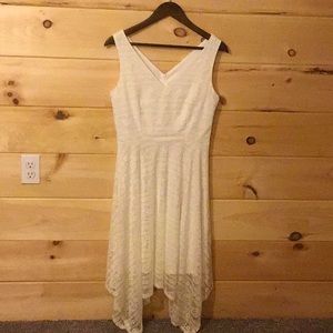 White lace handkerchief dress.